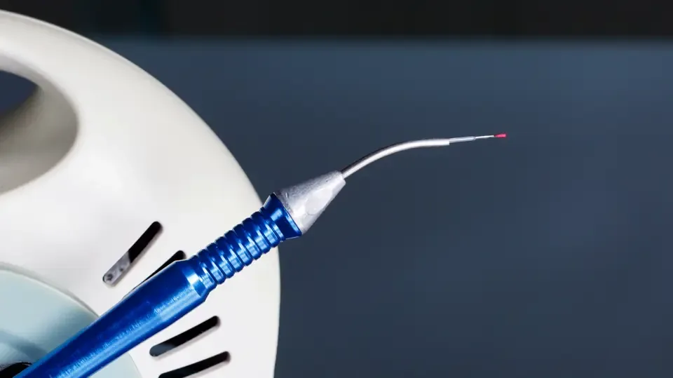 Close-up of the tip of a dental laser handpiece